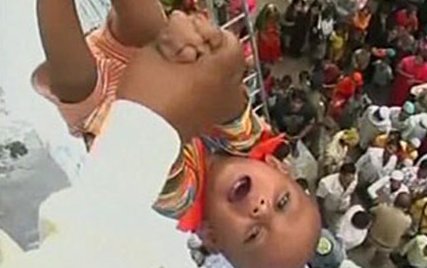 Baby Tossing Ritual In India